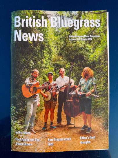 Paul Armer and the Dawn Chorus on the cover of British Bluegrass News